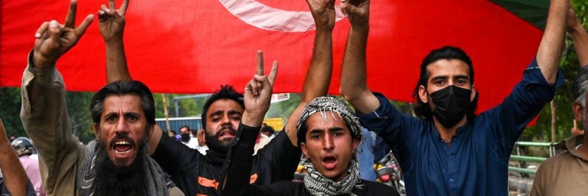 Imran Khan supporters celebrate.