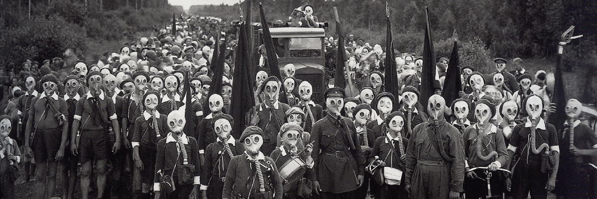 In 1937, members of the USSR's Young Pioneers Defense , organized to protect the Motherland, pose in gas masks to support their slogan, "Always Prepared!"