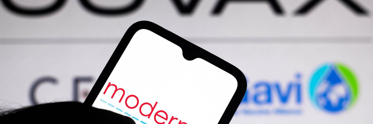 In this photo illustration the Moderna logo seen displayed on a smartphone screen with the logo of Covax Facility in the background.