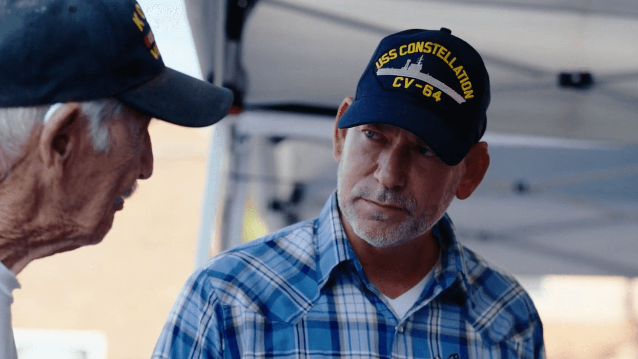 Independent US Senate candidate Dan Osborn talks to a voter in Nebraska