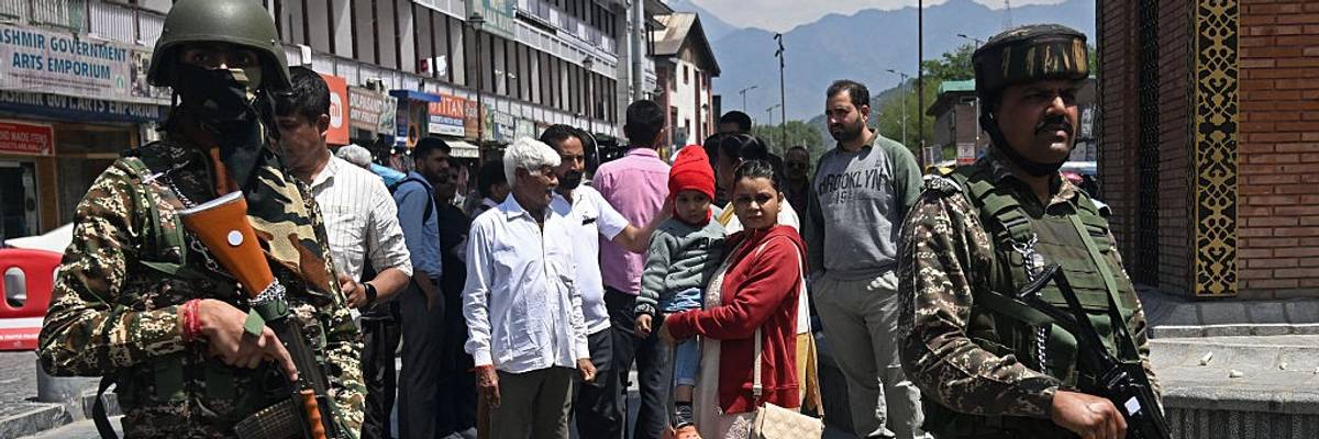 Indian soldiers and tourists in Srinagar, Kashmir