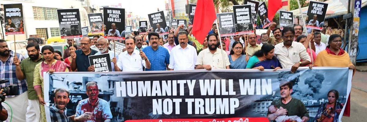Indians protest the US-Israeli war on Iran, holding a banner reading: "Humanity will win, not Trump."