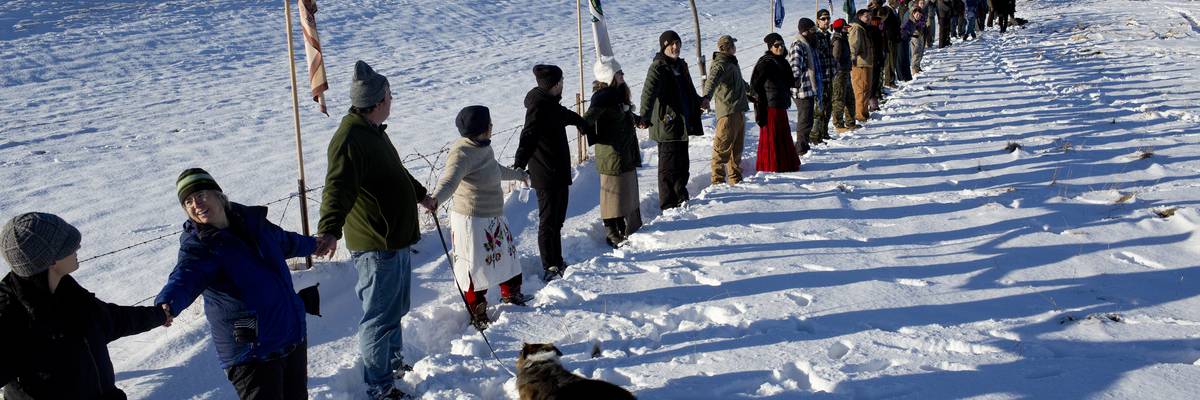 Indigenous people and environmental advocates demonstrate against the Dakota Access Pipeline