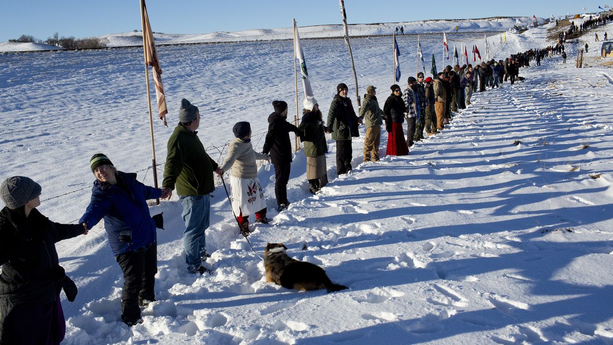 Indigenous people and environmental advocates demonstrate against the Dakota Access Pipeline