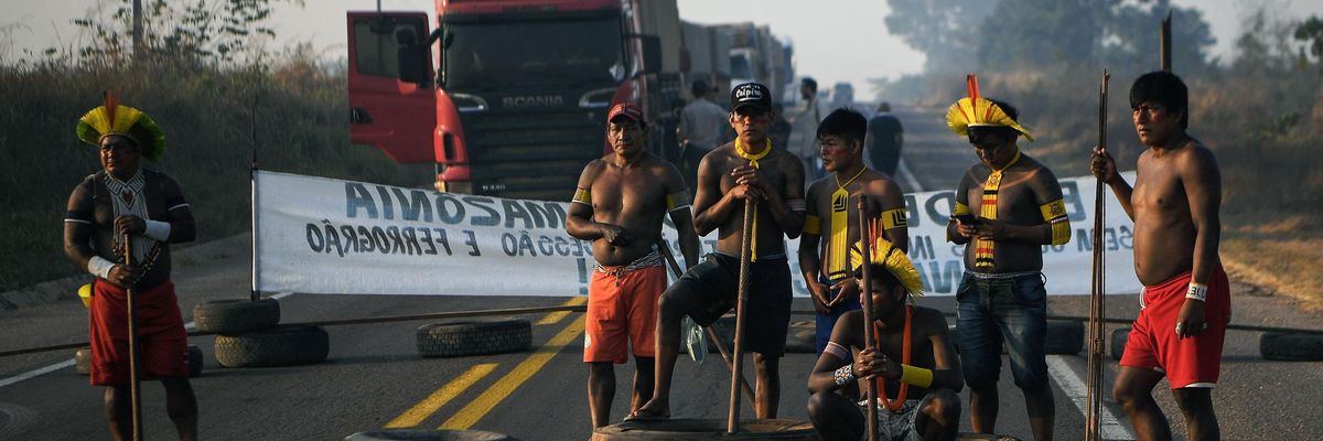Indigenous protesters block a highway in Brazil.