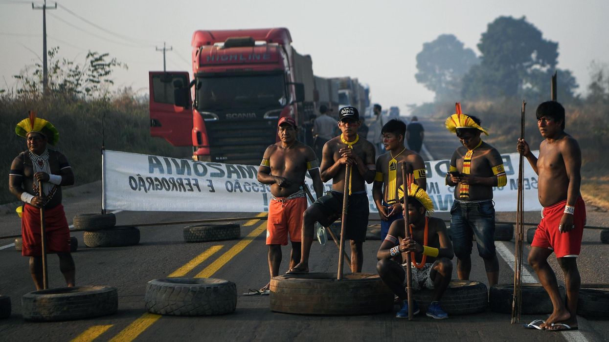 Indigenous protesters block a highway in Brazil.