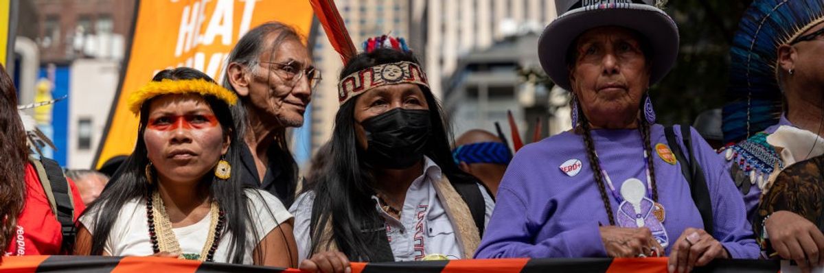 Indigenous protesters march against fossil fuels.