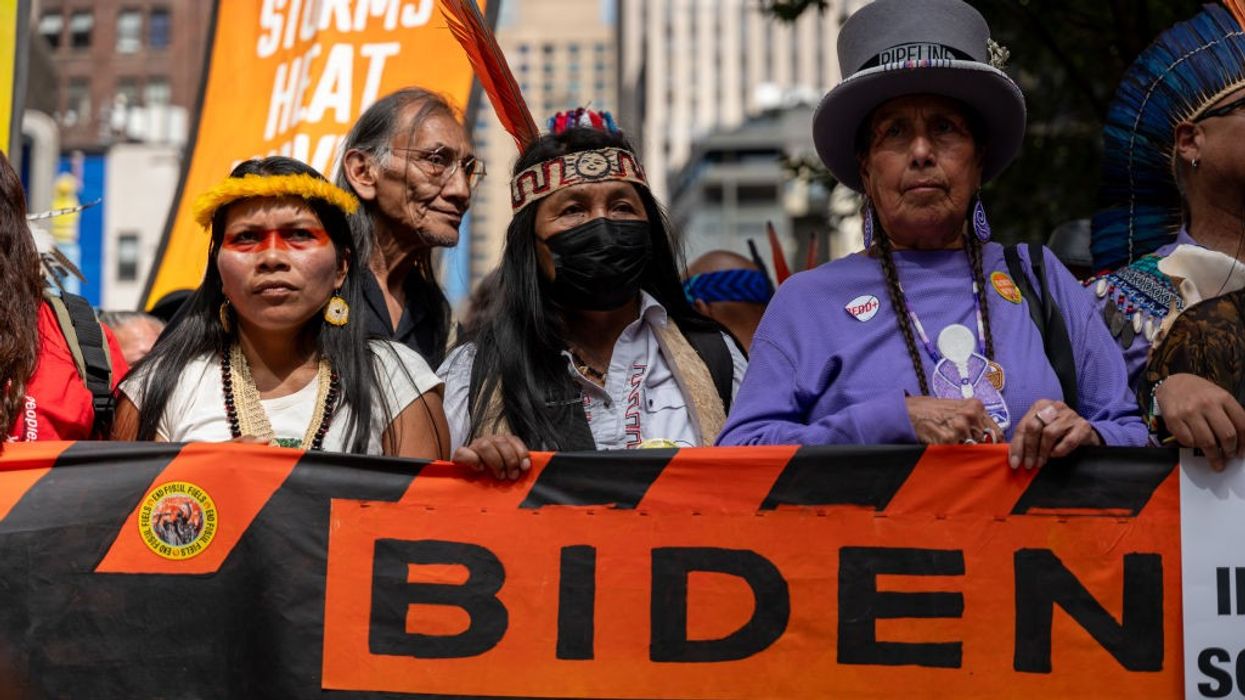 Indigenous protesters march against fossil fuels.