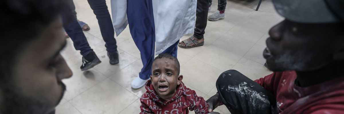 Injured Palestinians, including children, are brought to Al-Aqsa Martyrs Hospital