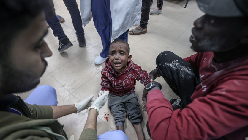 Injured Palestinians, including children, are brought to Al-Aqsa Martyrs Hospital