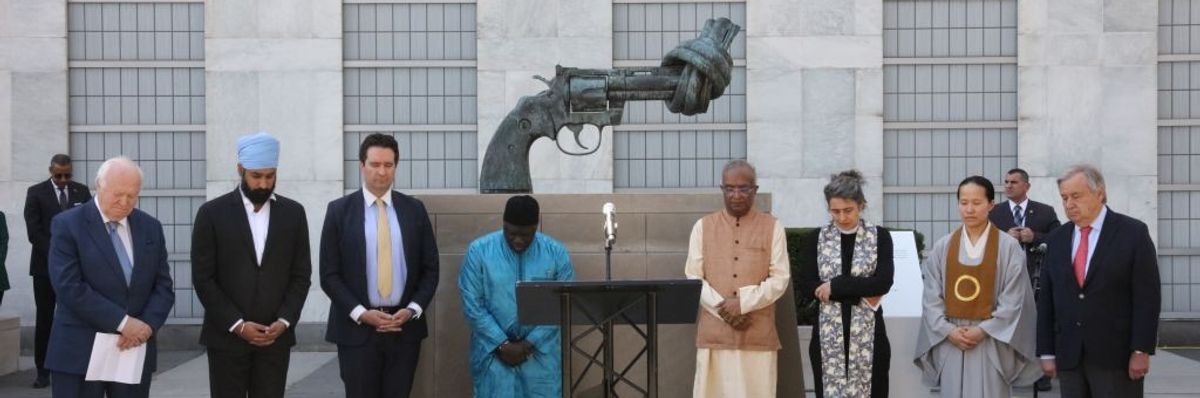 Interfaith leaders pray outside of U.N. headquarters