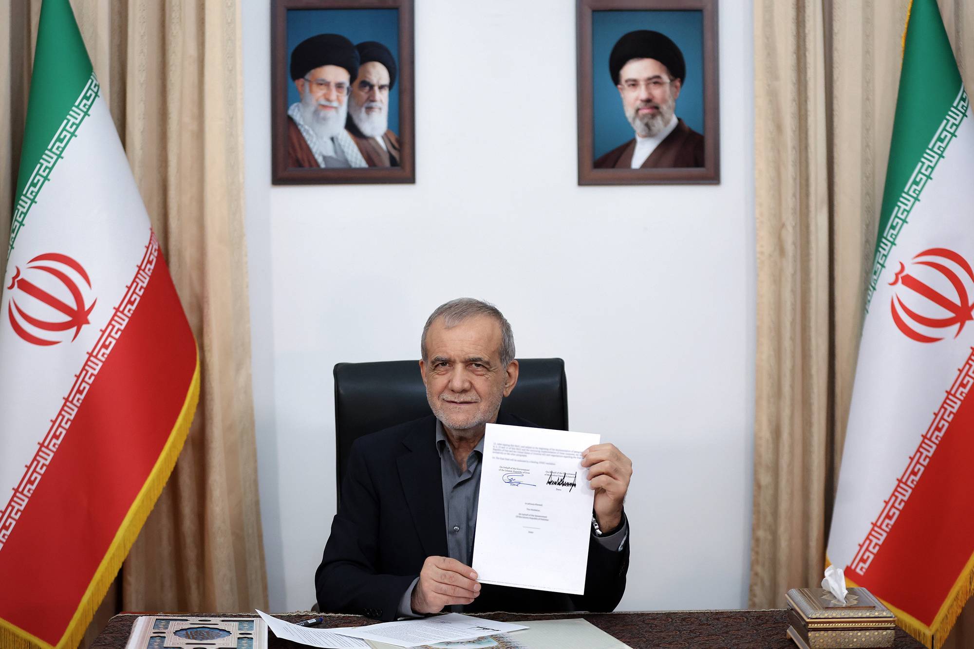 Iranian President Pezeshkian signs agreement aimed at ending Iran-U.S. conflict