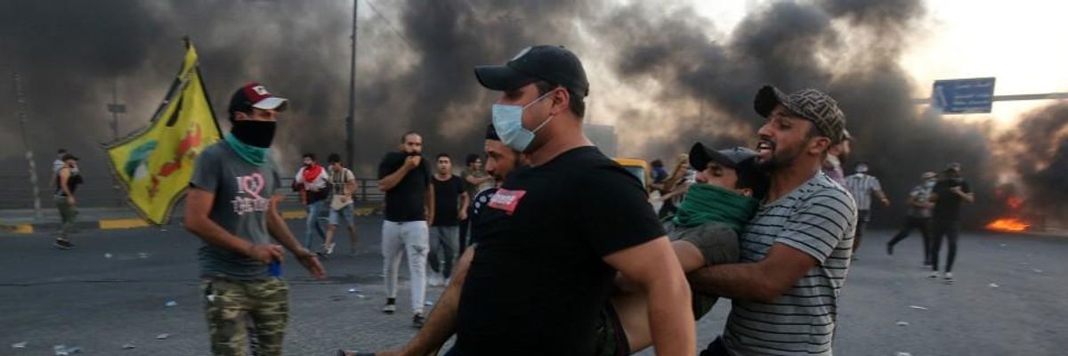 Iraqi Prime Minister to Step Down as Human Rights Defenders Condemn Security Forces' Attacks on Anti-Government Protesters
