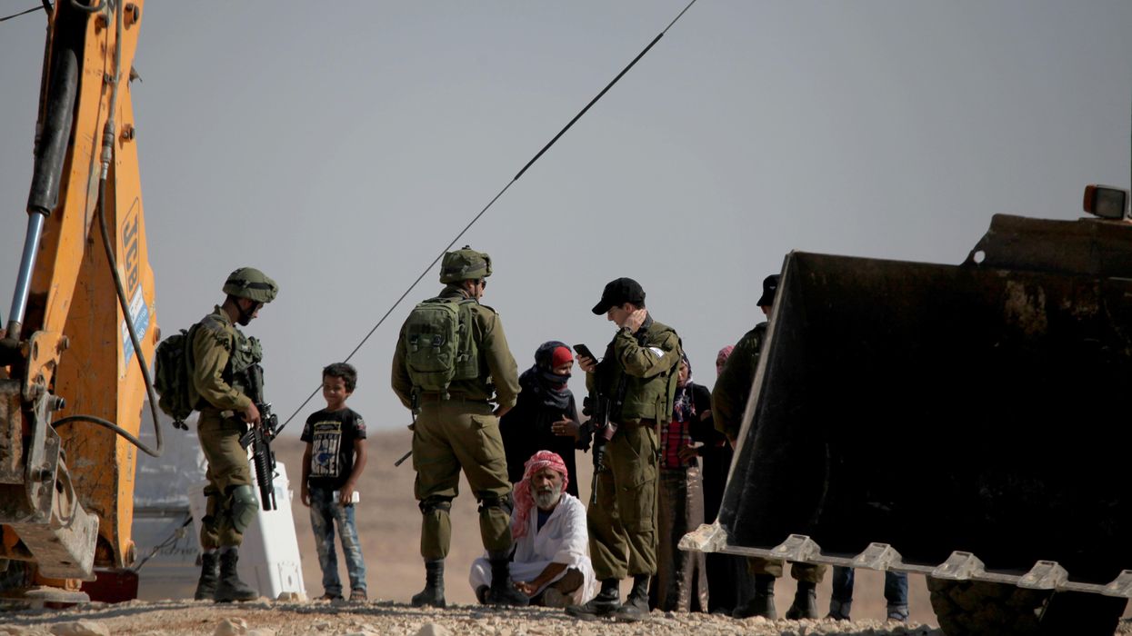 Israel forces demolish Palestinian buildings in the Masafer Yatta neighborhood of southern Hebron, West Bank on August 14, 2017.