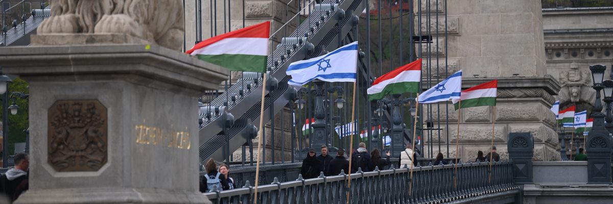 Israeli and Hungarian National flags are raised on the oldest Hungarian bridge, the Széchenyi Chain Bridge in Budapest