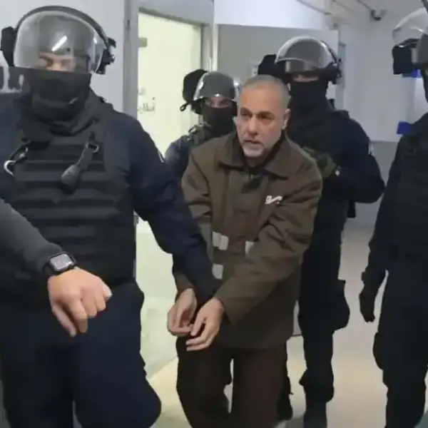 Israeli forces in black move Dr. Hussam Abu Safiya