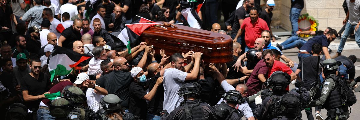 Israeli occupation forces are attacking Palestinians during the funeral of killed Al Jazeera journalist Shireen Abu Akleh.