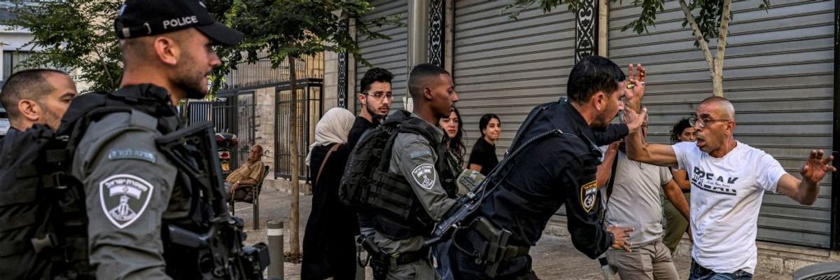 Israeli police confront Palestinian man during Jenin raid