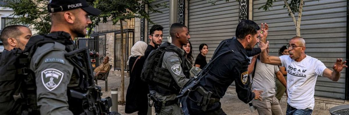 Israeli police confront Palestinian man during Jenin raid