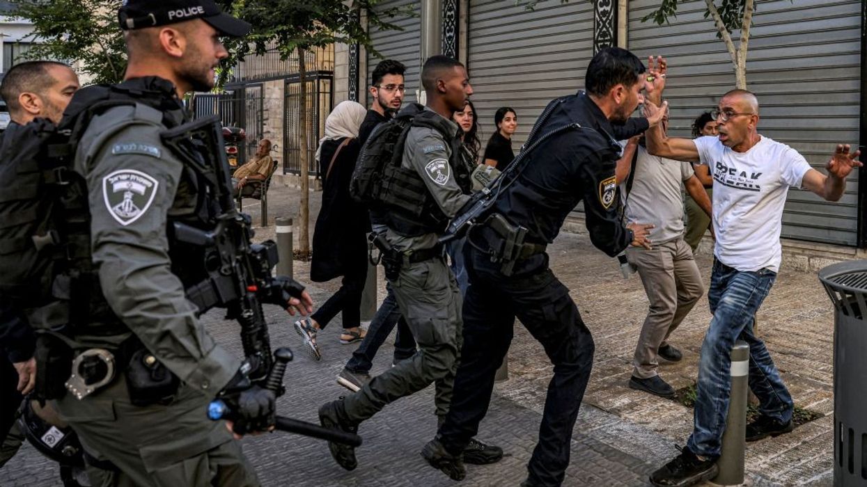 Israeli police confront Palestinian man during Jenin raid
