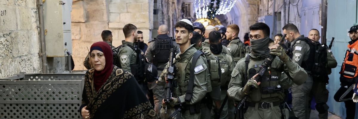 Israeli police officers force Palestinian worshipers to leave the Al-Aqsa Mosque compound in occupied East Jerusalem on April 5, 2023.