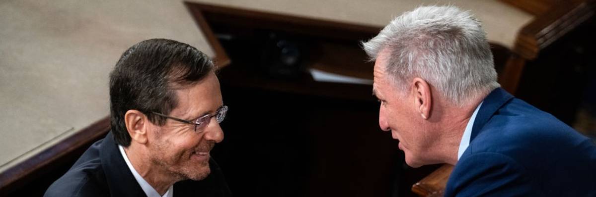 Israeli President Isaac Herzog and U.S. House Speaker Kevin McCarthy shake hands.