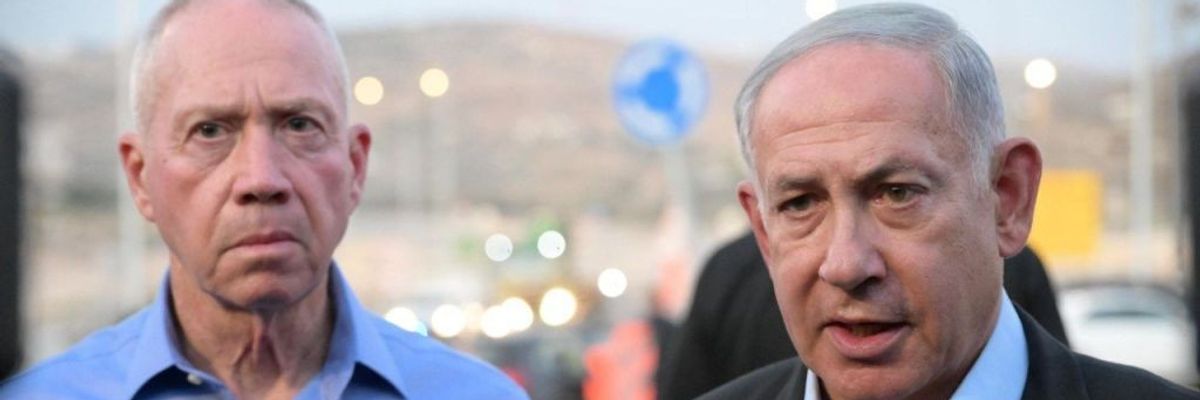 Israeli Prime Minister Benjamin Netanyahu (R) and Israeli Defense Minister Yoav Gallant (L) stand side by side.