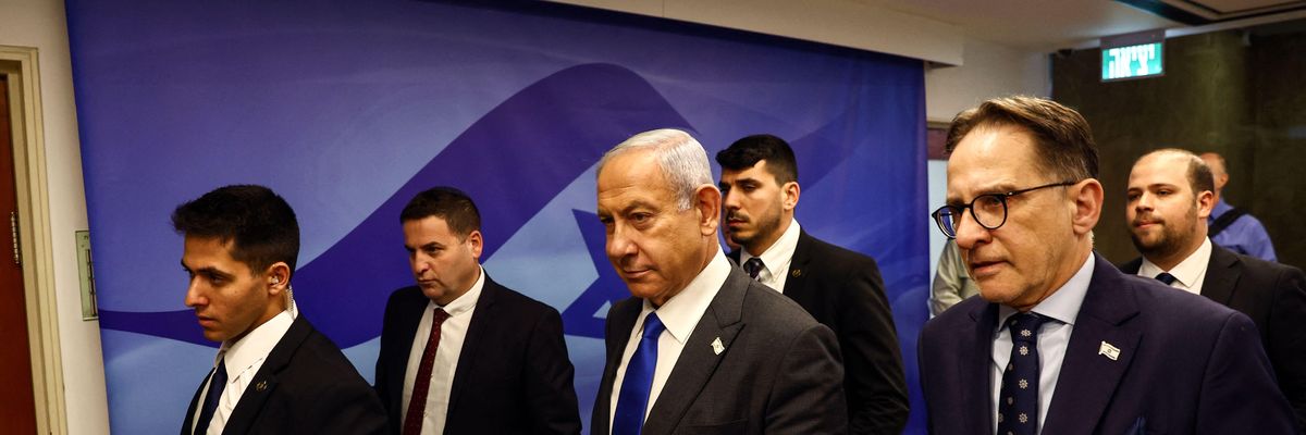 Israeli Prime Minister Benjamin Netanyahu walks to a cabinet meeting