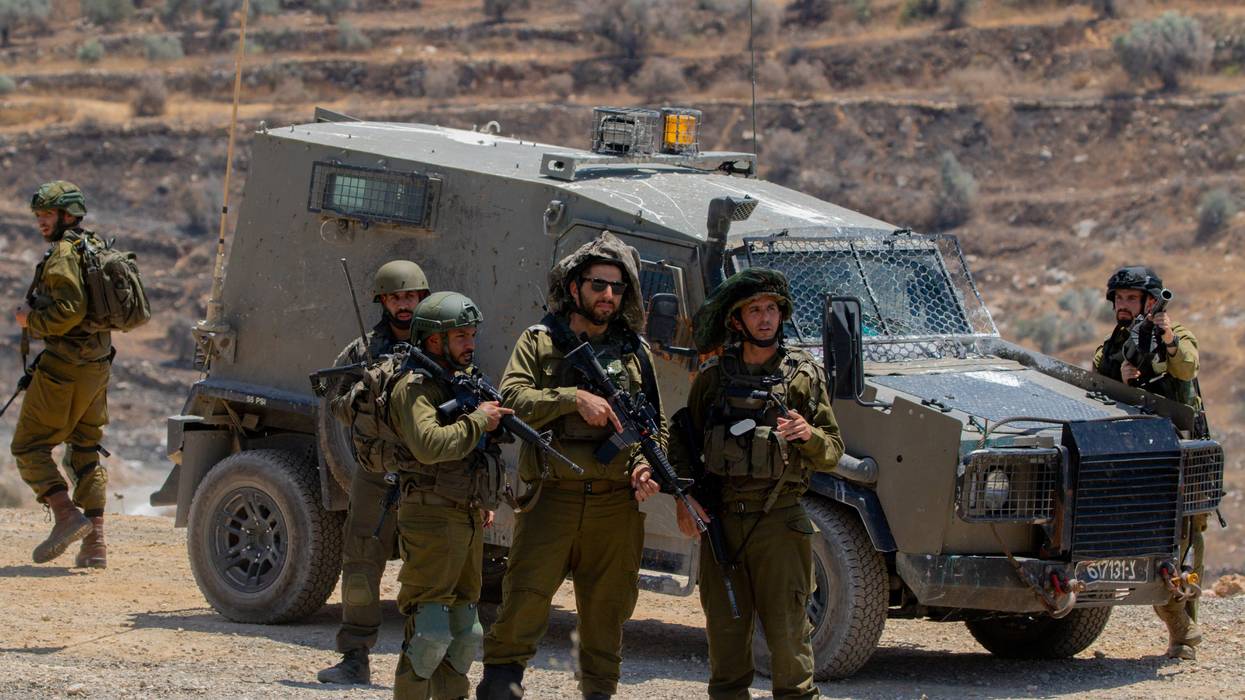 Israeli soldiers and armored vehicles