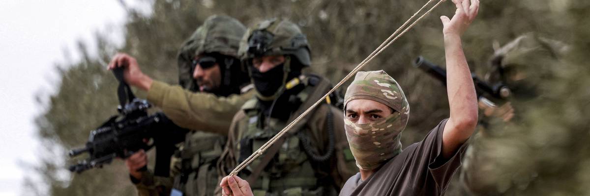 Israeli soldiers and settlers
