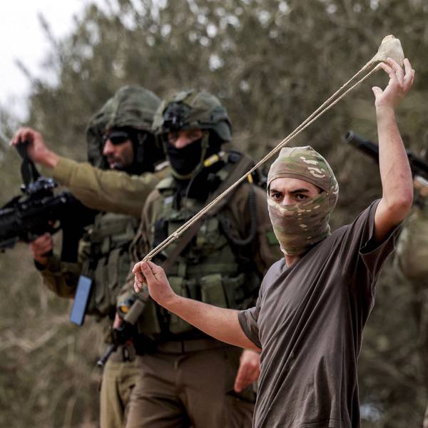 Israeli soldiers and settlers