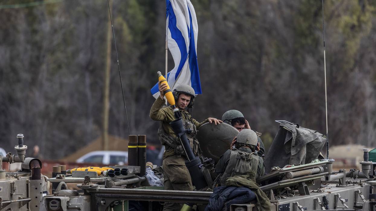 Israeli soldiers fire missiles