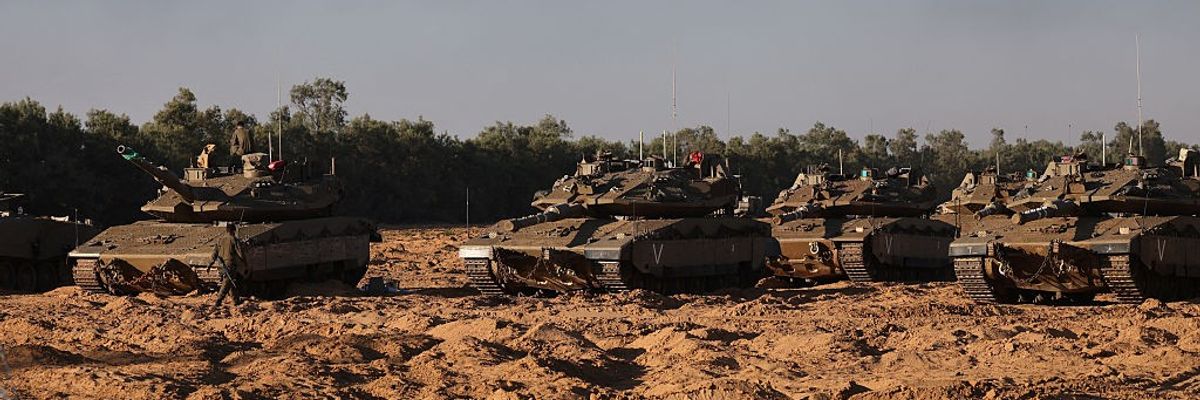 Israeli tanks amass near the Gaza border
