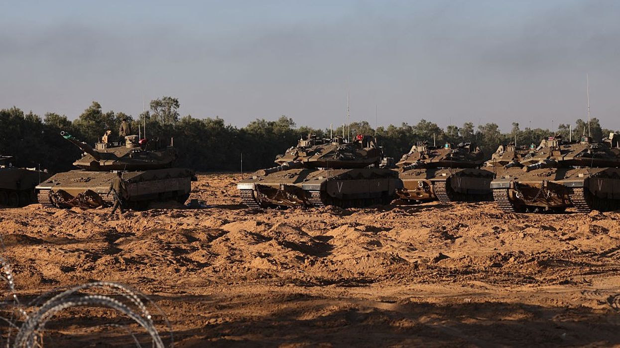 Israeli tanks amass near the Gaza border