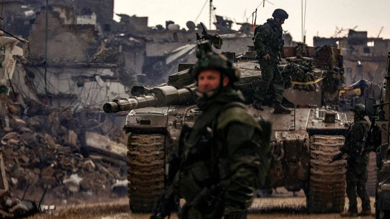 Israeli troops and a tank in Gaza