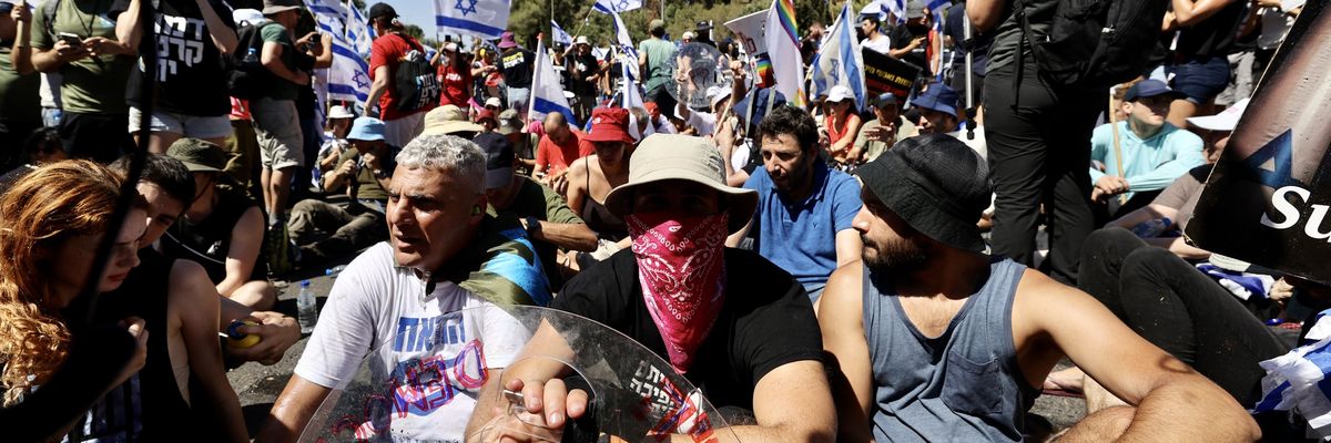 Israelis protest in front of the Knesset