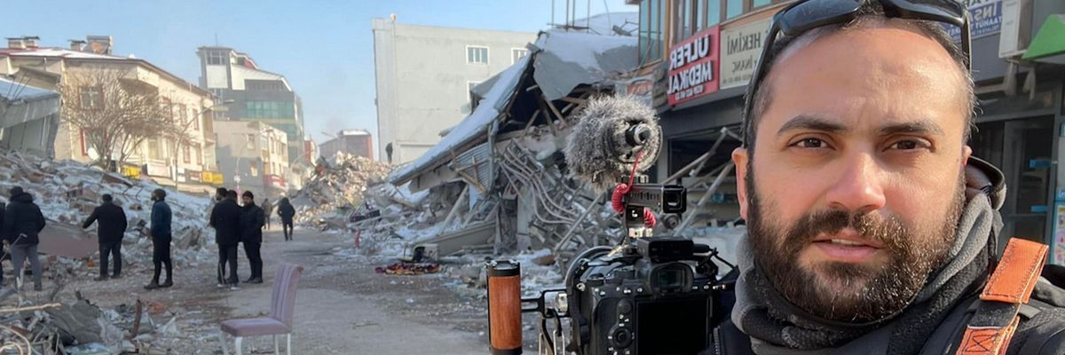 Issam Abdallah with his camera in the aftermath of the