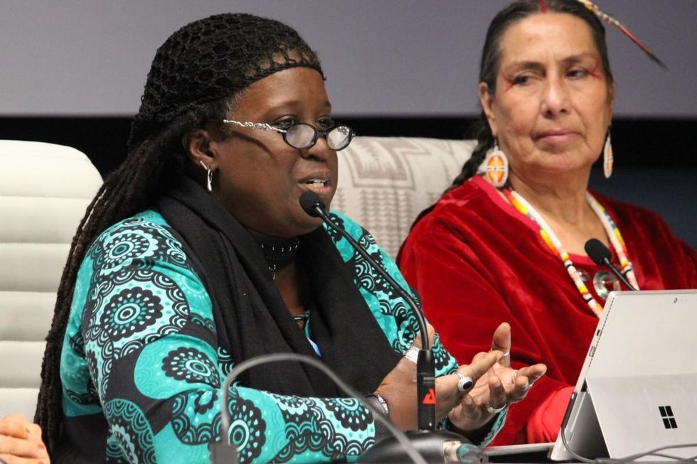 Jacqui Patterson, shares the experiences of frontline communities in the United States as they face extractive industries and climate catastrophe, during a formal U.N. side event at the UNFCCC COP25 in Madrid, Spain. (Photo: Katherine Quaid/WECAN International)