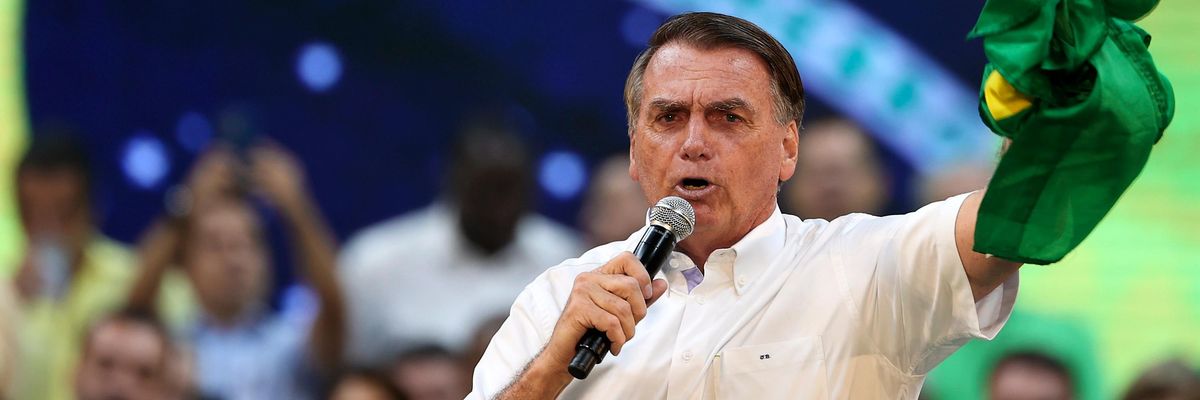 Jair Bolsonaro gestures while speaking during a campaign rally