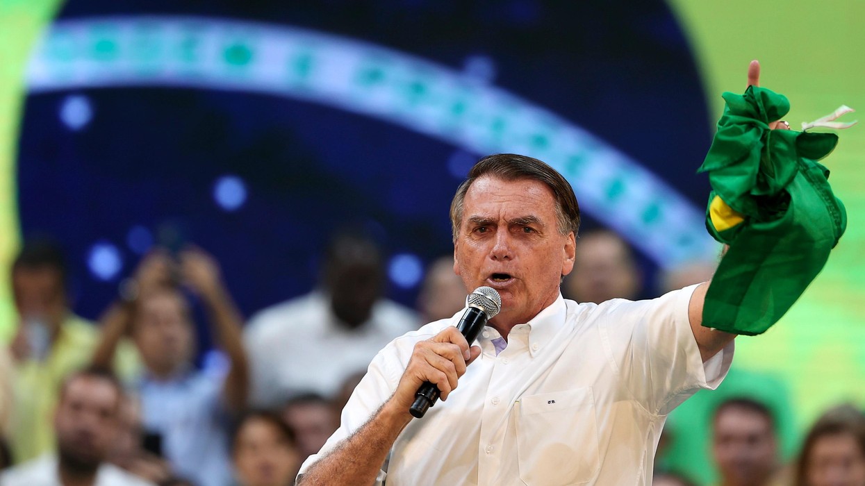 Jair Bolsonaro gestures while speaking during a campaign rally