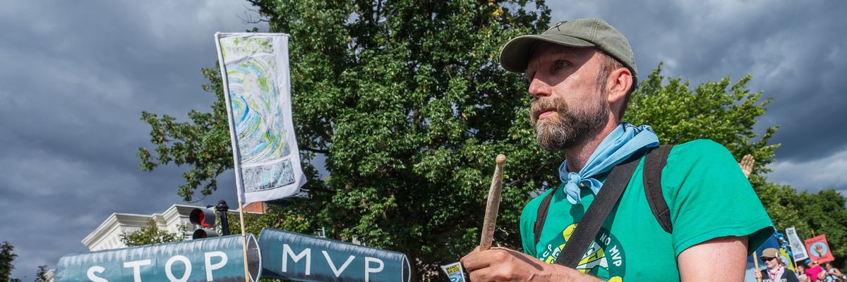 Jan Burger and other climate advocates demonstrate against the Mountain Valley Pipeline project in Washington, D.C. on September 8, 2022.