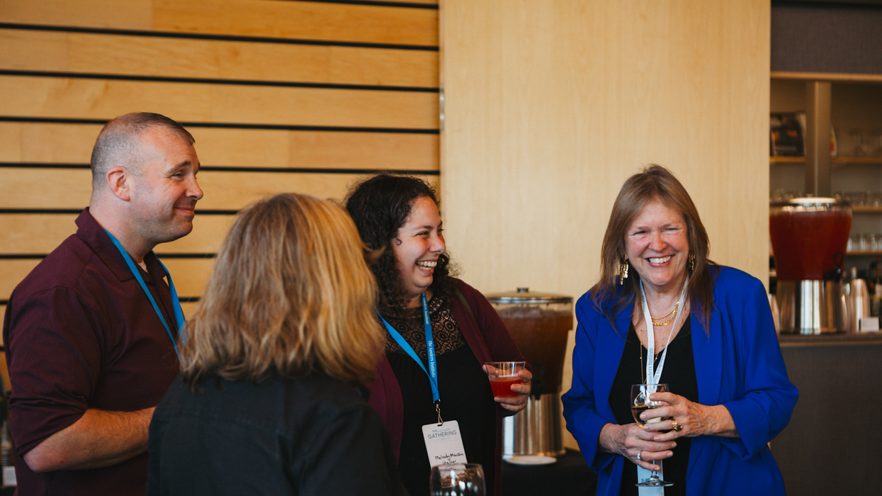 Jane O'Meara Sanders (right) speaks with attendees of the Sanders Institute Gathering