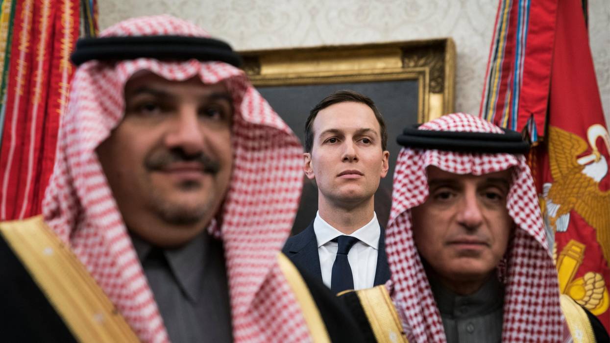 Jared Kushner stands with Saudi officials in the White House