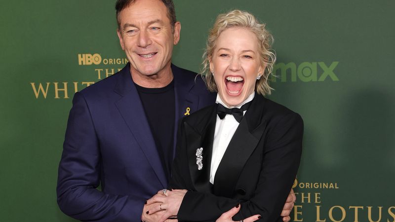 Jason Isaacs and Carrie Coon at White Lotus premier.