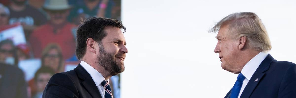 JD Vance shakes hands with Donald Trump