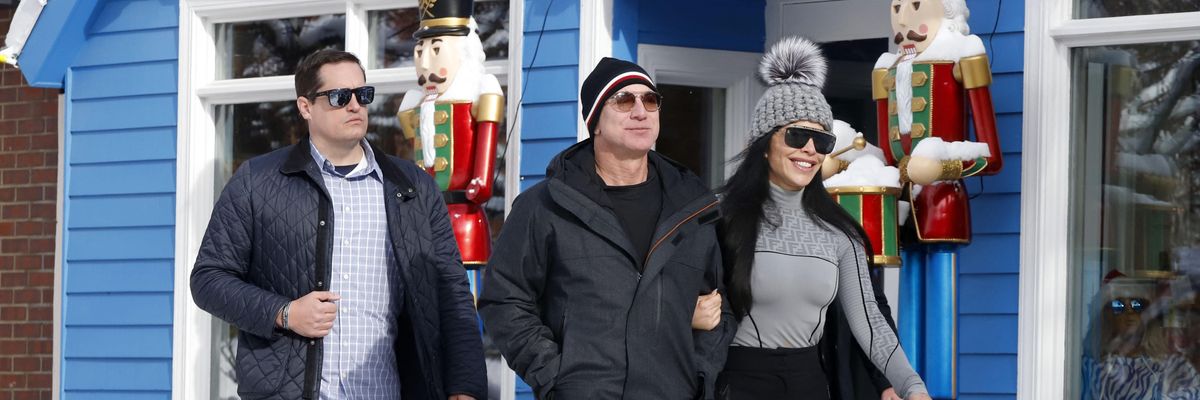 Jeff Bezos and Lauren Sanchez are seen leaving the White House Tavern on December 29, 2022 in Aspen, Colorado.