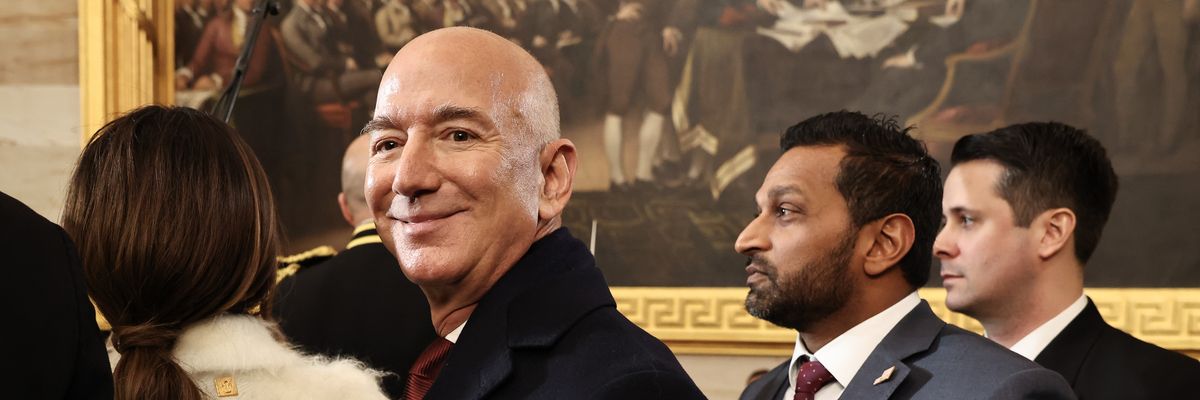 Jeff Bezos looking smug at Trump's inauguration.