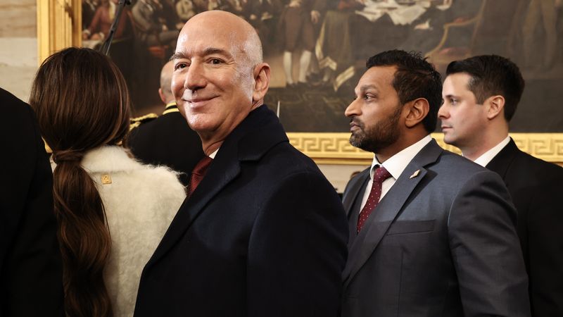 Jeff Bezos looking smug at Trump's inauguration.