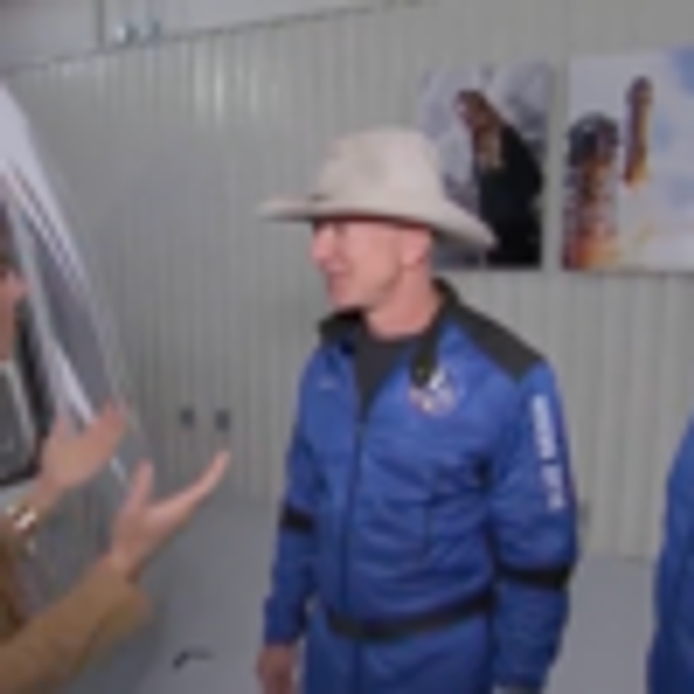 Jeff Bezos speaks to the media following his brief flight to space