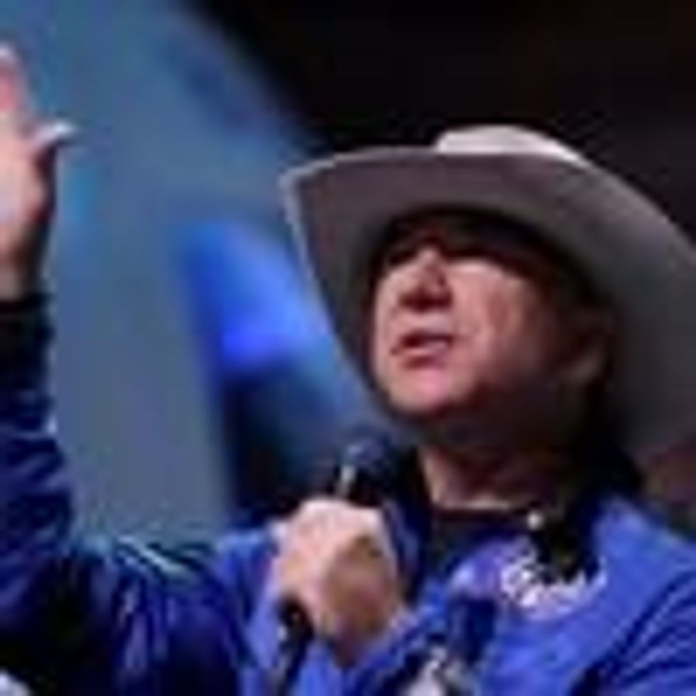 Jeff Bezos speaks to the media